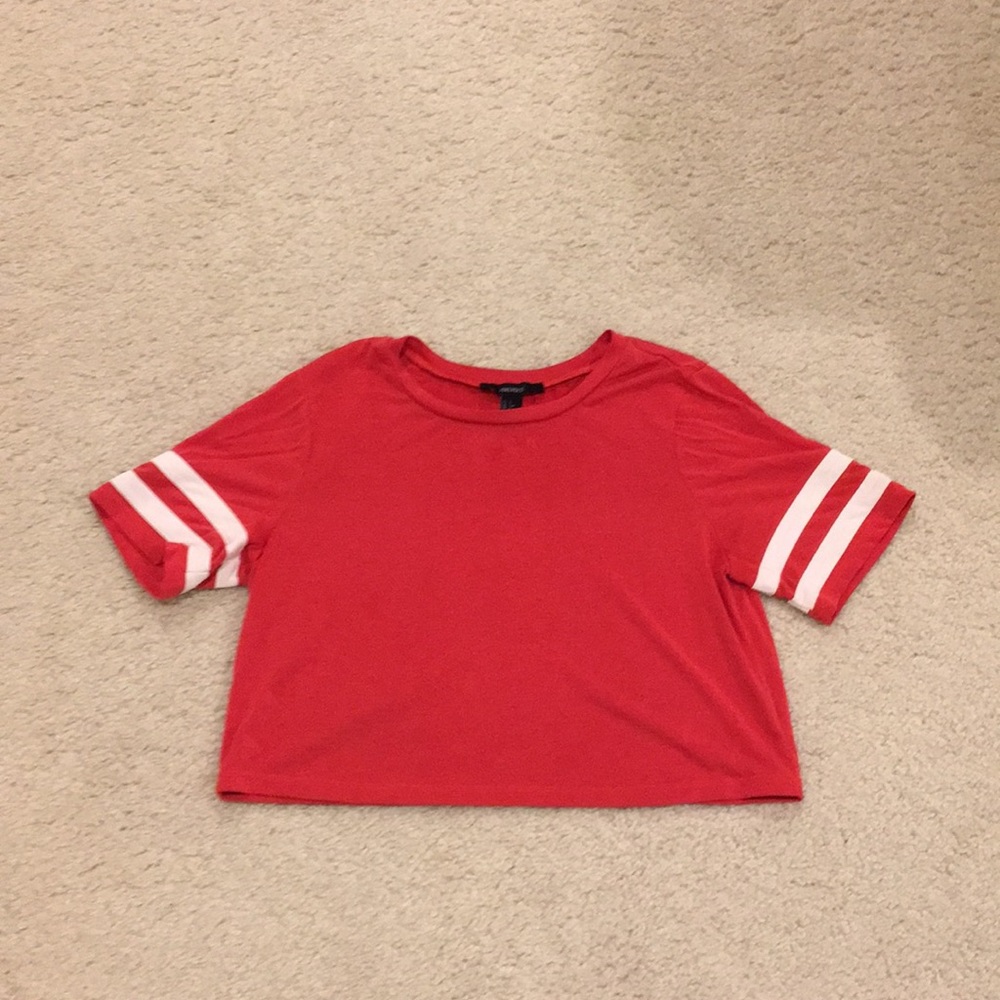 Red flowy crop top with white stripes on sleeves